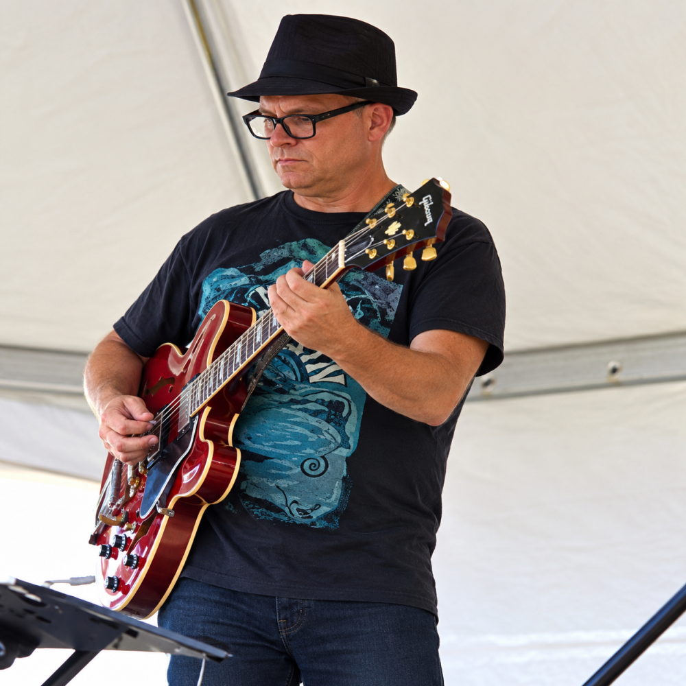 DAMIEN RILEY, world musician and performer